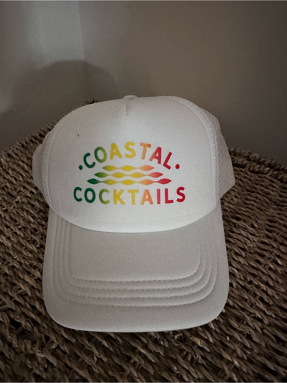 White Trucker Hat with Rainbow Gradient Logo